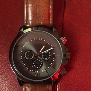 Shiny lookers watch. $18